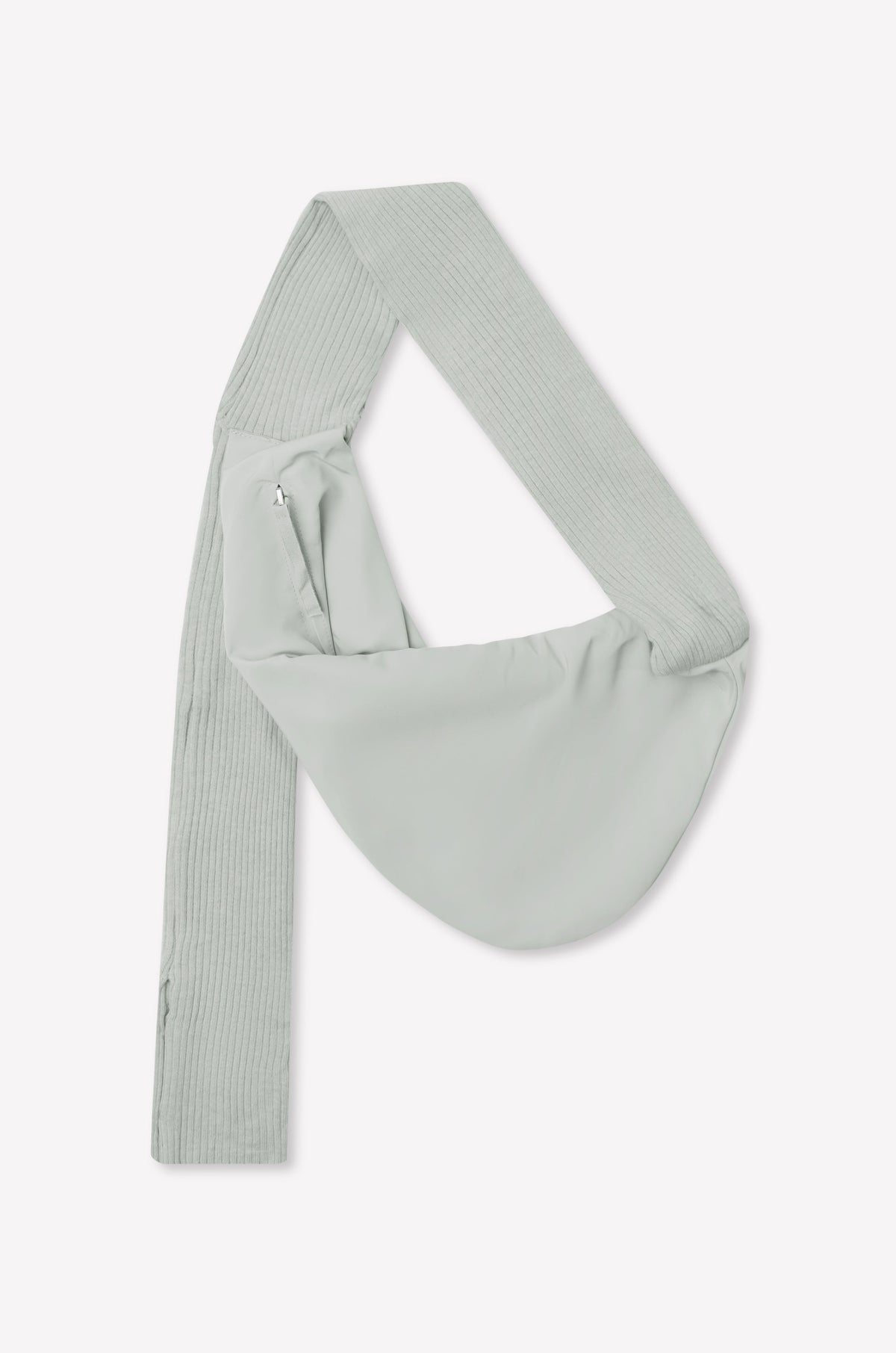 A baby blue asymmetrical sling saddle bag, named Knit Strap Bag, features a wide, ribbed knit shoulder strap and a side zipper, displayed against a plain white background.