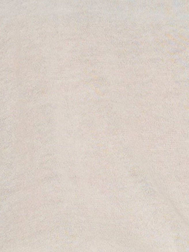 A close-up of the Rolled Knit Top in Off White shows its light beige textured knit, subtle weave patterns, and gentle folds.