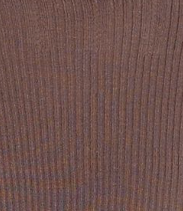 Close-up of the Open Work Longsleeve - Hazel, featuring a brown wood-like surface with vertical grain lines and natural texture, echoing the delicate pattern of the sheer fine knit top.
