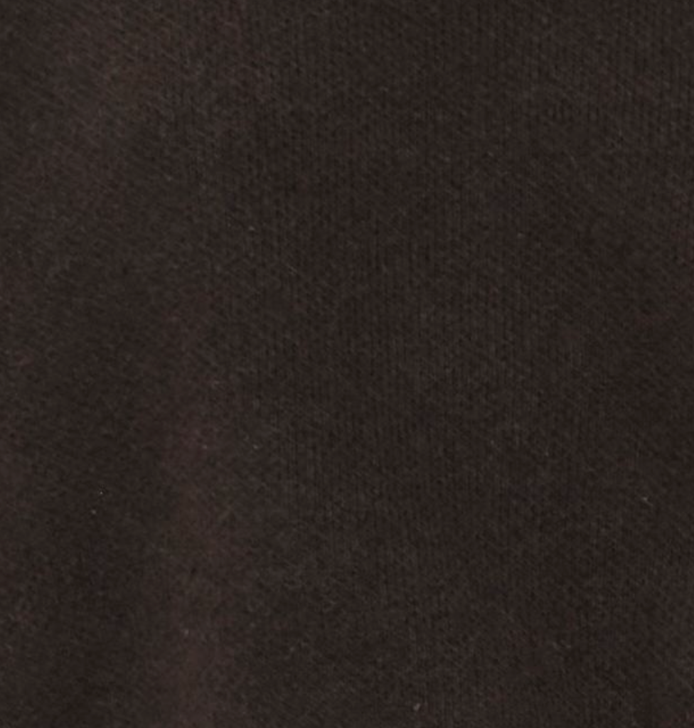 A close-up of the Collared Pullover - Burnt Wood from Deiji Studios highlights the soft texture of its relaxed black knit fabric.