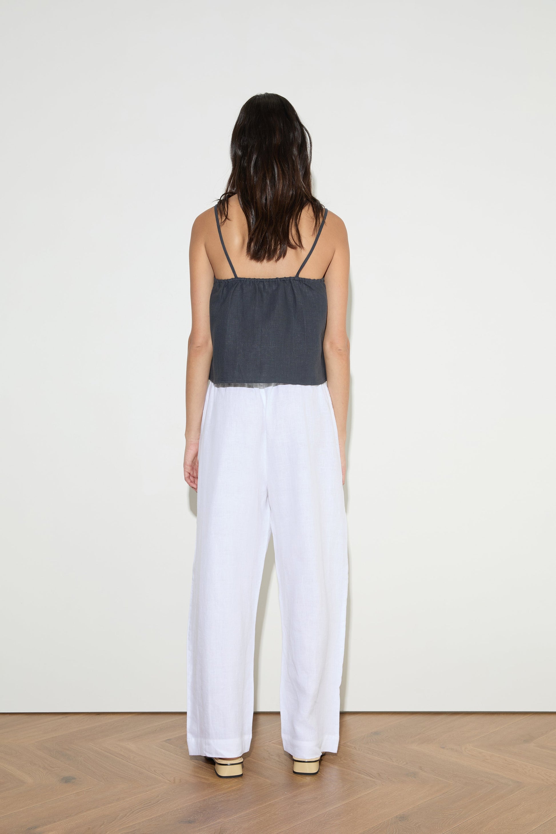 female model wears the asymmetric tie top by Deiji Studios in ink


an elevated asymmetric top with a softly gathered front neckline and elastic neckline


made from 100% GOTS certified organic, OEKO-TEX 100 certified and EU certified stone washed french linen

paired with a white cotton trouser