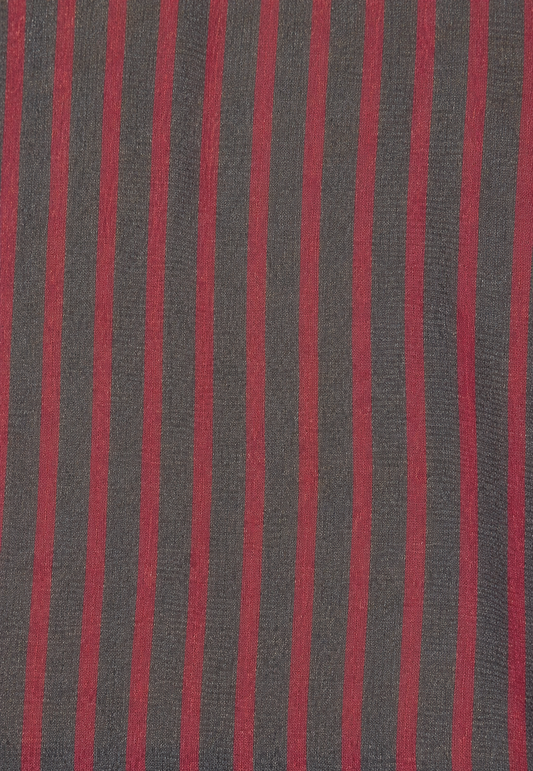 Close-up of the Cross Neck Tee - Red Stripe fabric by Deiji Studios: a fine knit with red and charcoal vertical stripes, shown flat.