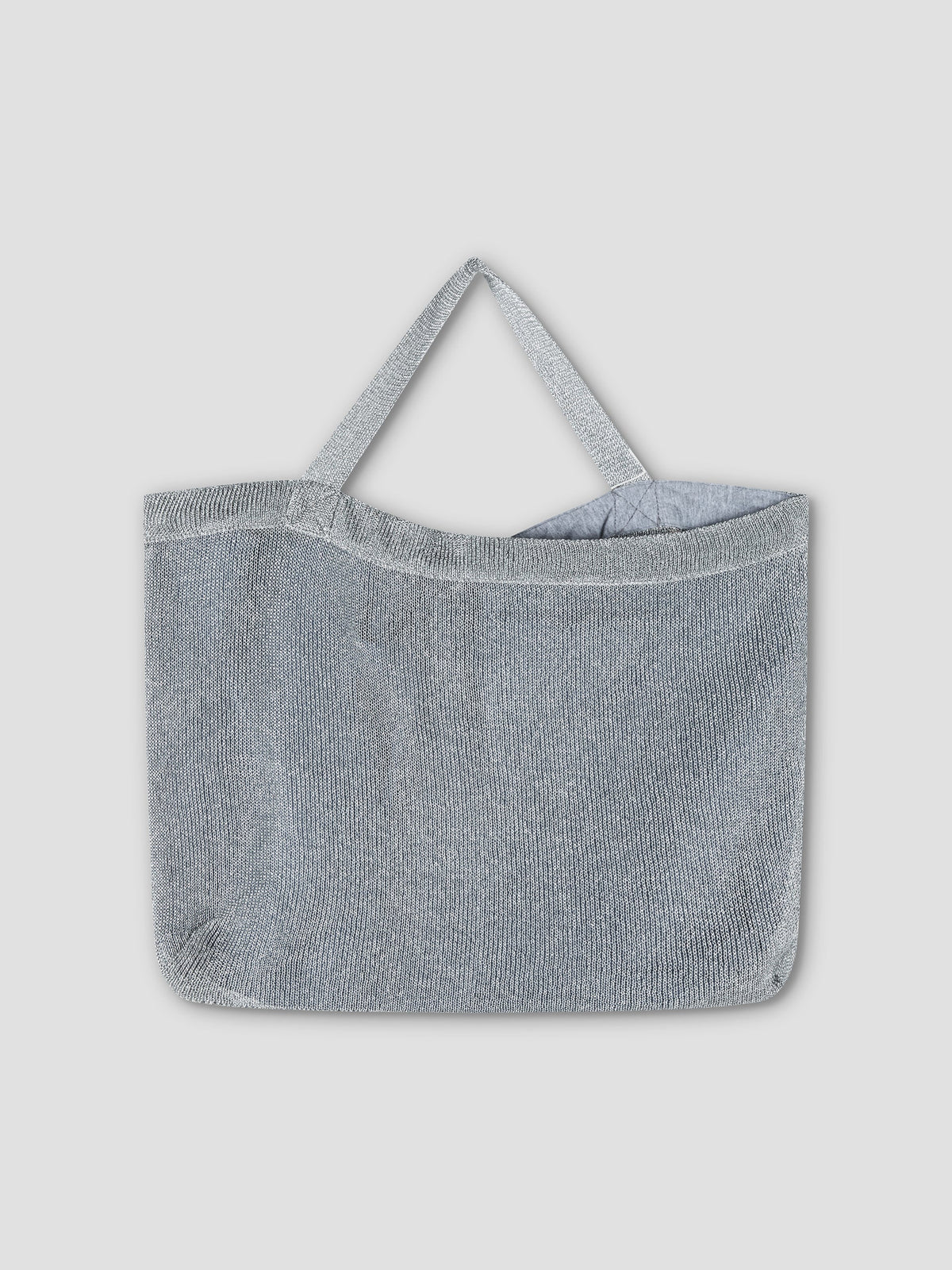 The Chain Bag - Silver is a light gray, rectangular mesh tote with two short handles and a minimalist design, shown against a plain light gray background.