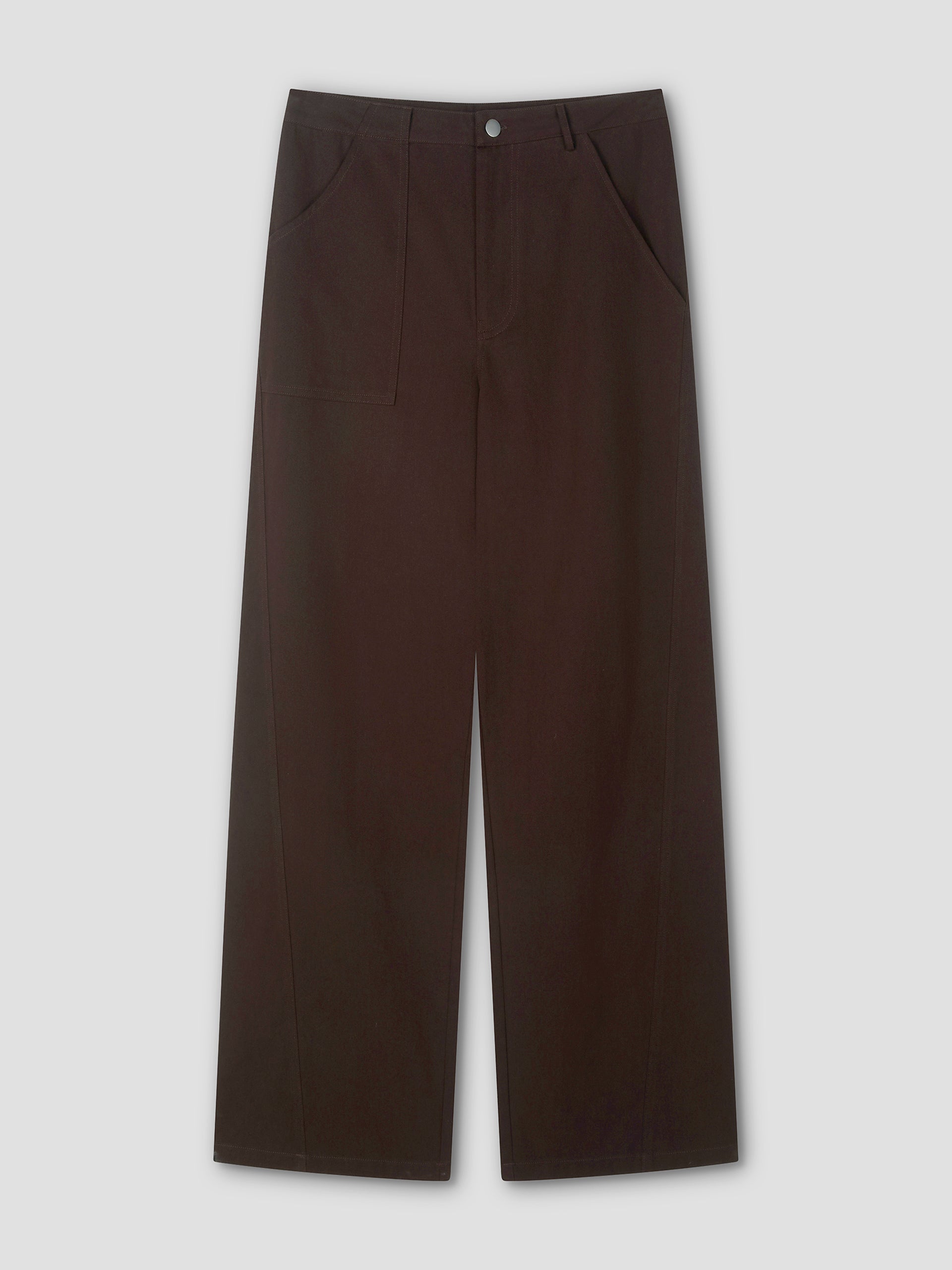 A pair of Pocket Jean wide-leg, dark brown pants with a high waist, front button closure, and side pockets is displayed flat on a light gray background.