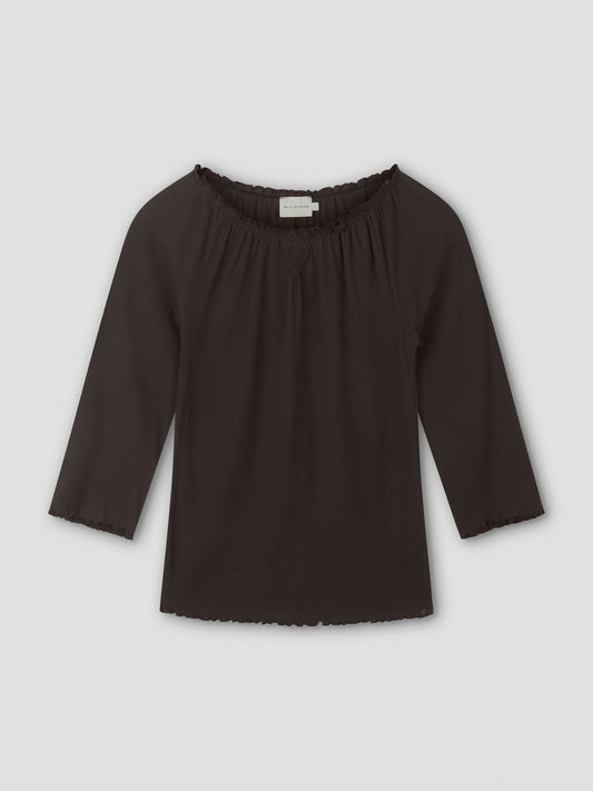 A brown, cotton flounce 3/4 sleeve top with an elastic neckline and ruffled edges on the sleeves and hem, laid flat on a light gray background.