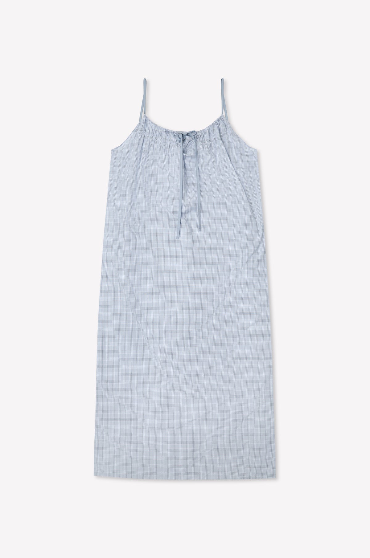 The Light Maxi Dress - Powder Check by Deiji Studios is a light blue sleeveless maxi made from organic cotton with thin straps, a gathered tie neckline, and a subtle check pattern, shown flat against a white background.
