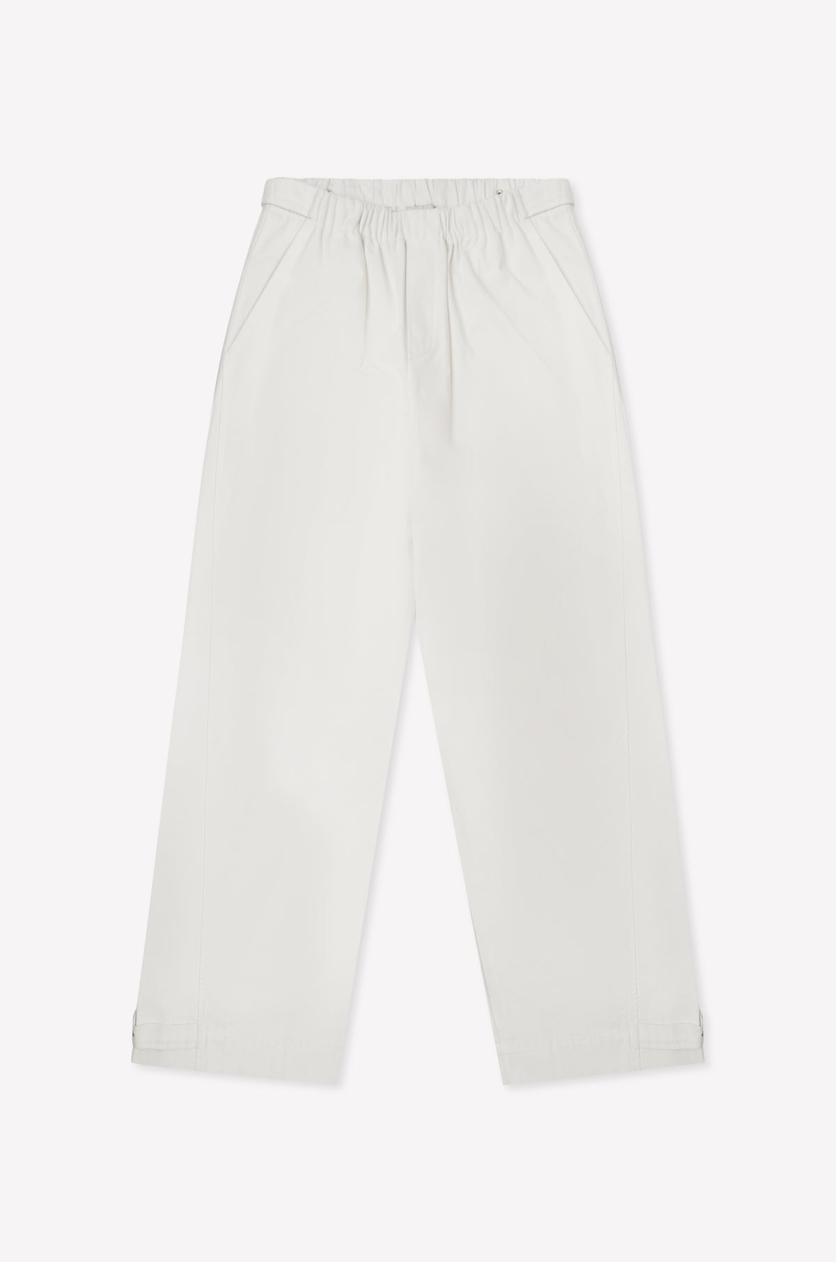 The Snap Tab Pant - White features a loose, wide-leg fit with an elastic waistband and side pockets, shown flat on a white background.