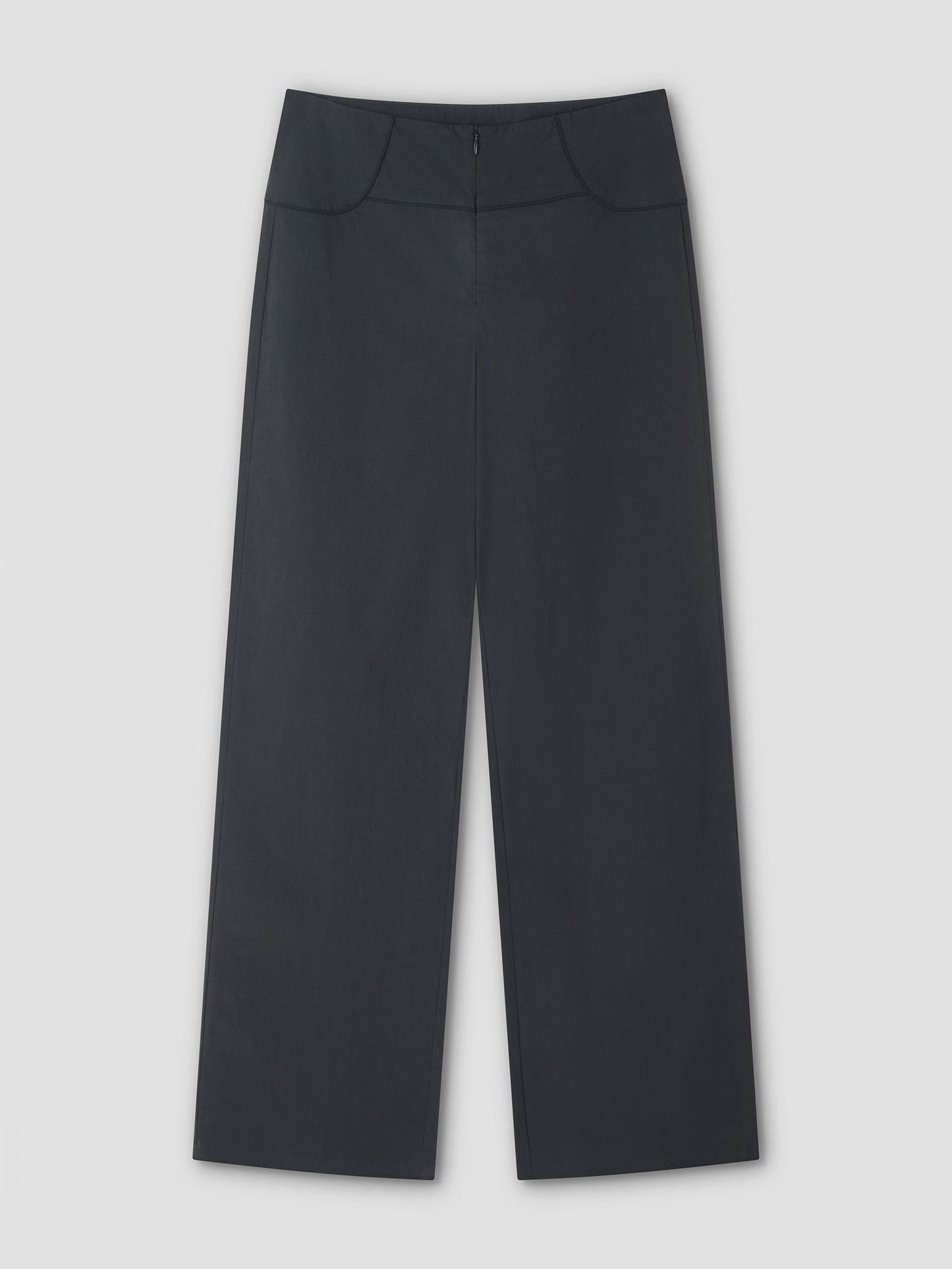 The Panelled Pant - Charcoal features a wide-leg, high-waisted design with front seams and a slight flare, straight-leg silhouette, shown flat on a light gray background.