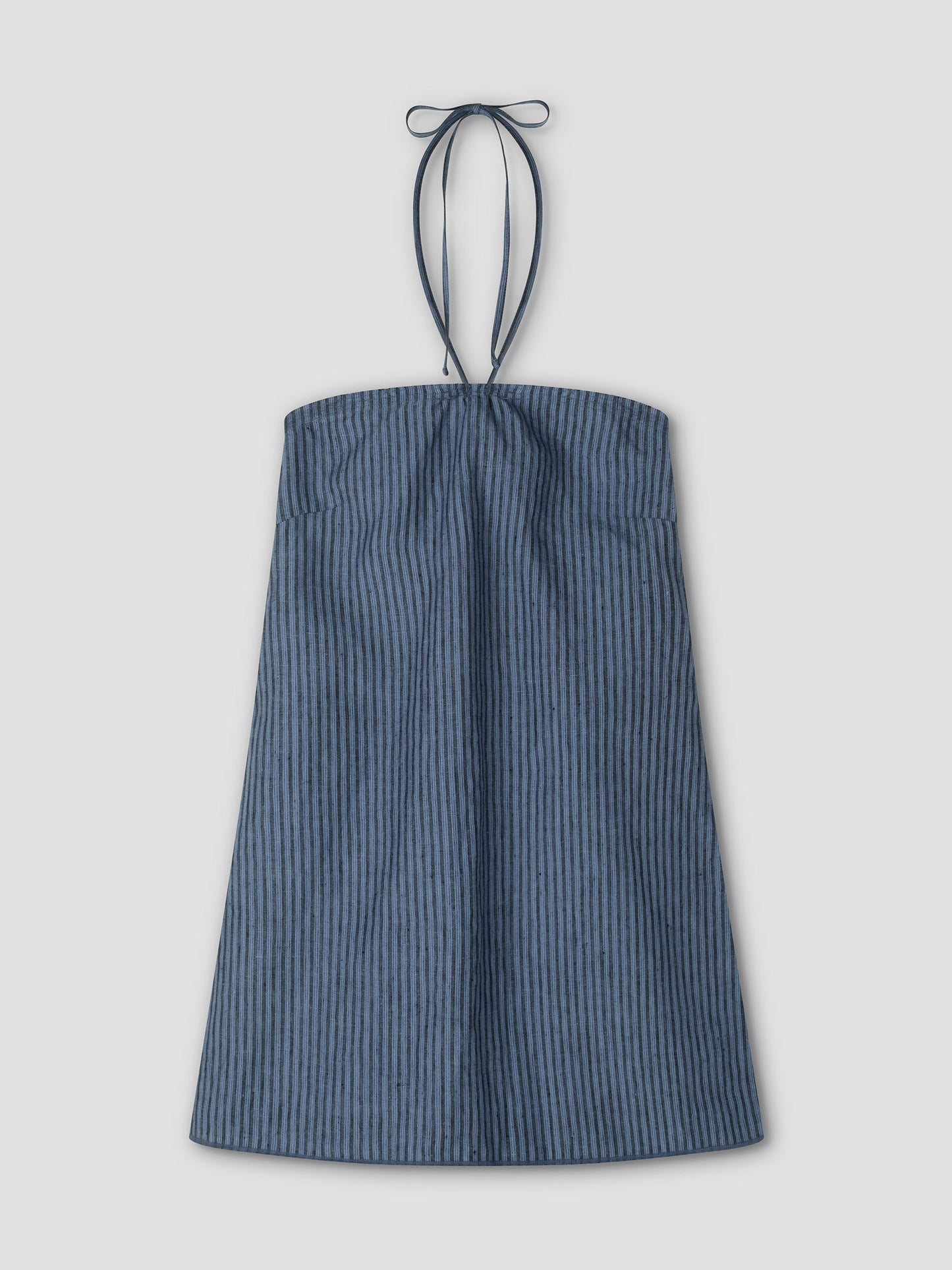 The Cross Over Dress - Azure Stripe is a sleeveless mini dress with blue and black stripes, thin tie halter straps, a gathered bust, and a flared A-line silhouette. It's shown flat on a light gray background.