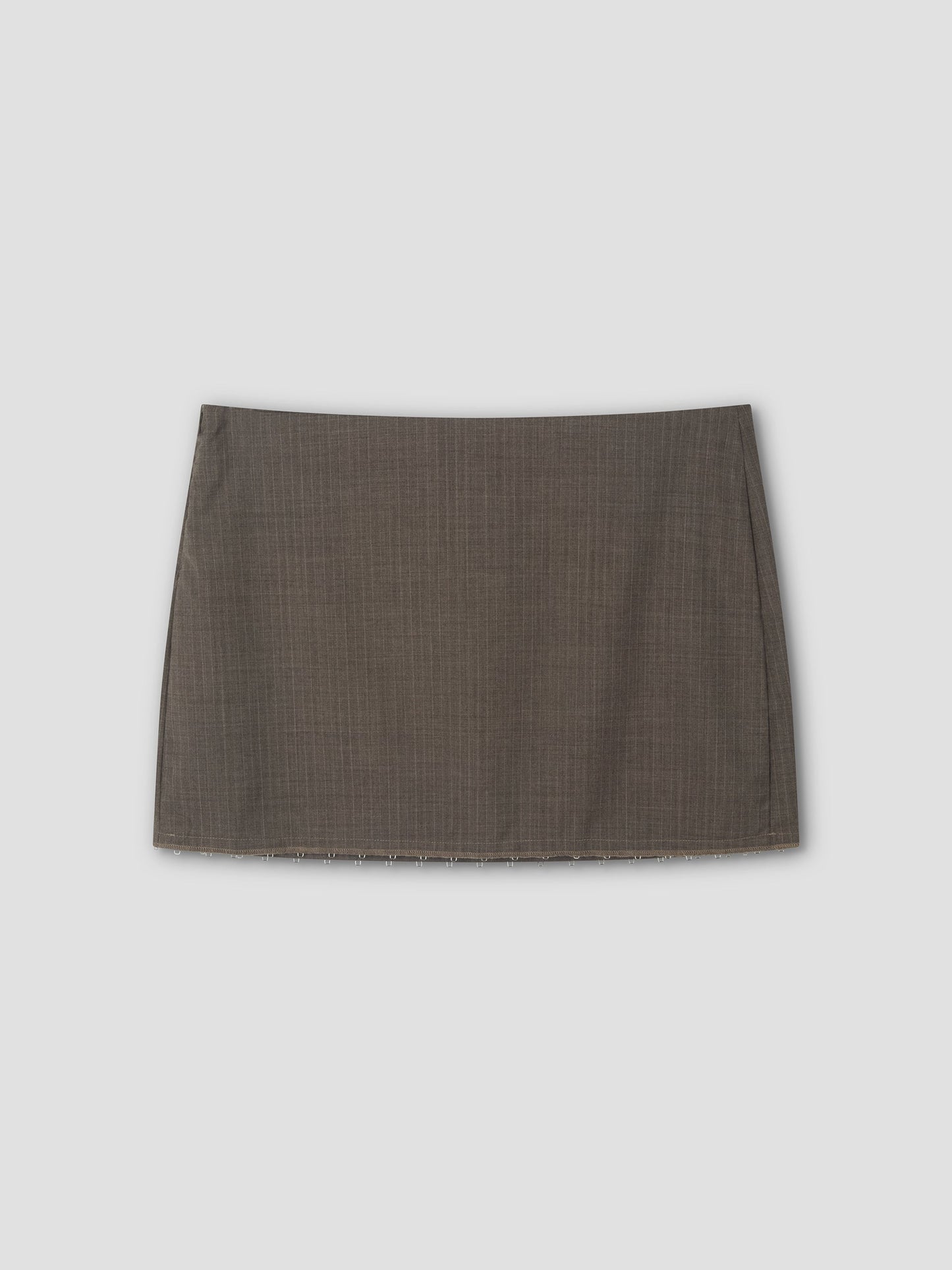 The Eye Skirt - Grey Pink Stripe is a mini-length skirt with subtle textured stripes, displayed flat on a light gray background.
