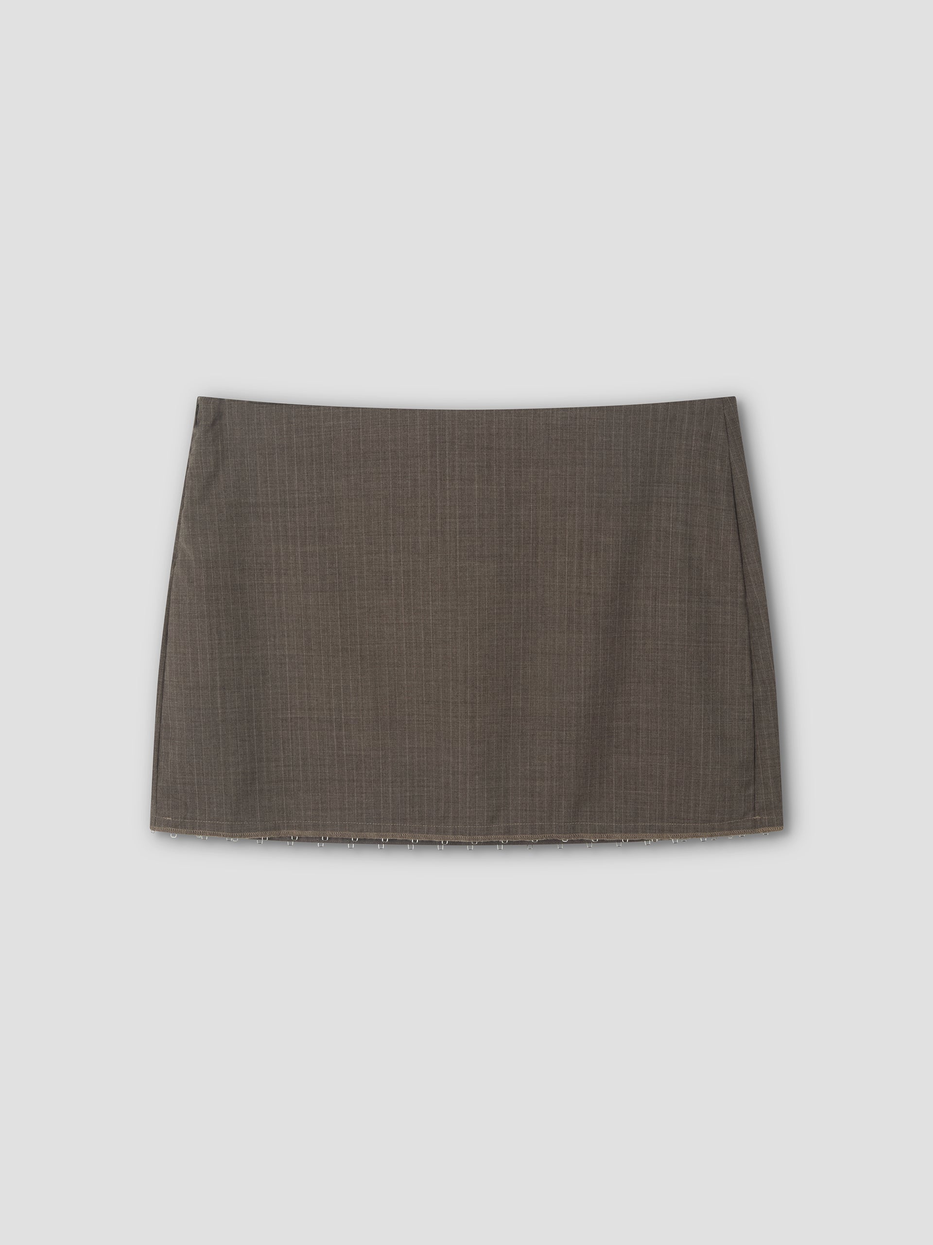 The Eye Skirt - Grey Pink Stripe is a mini-length skirt with subtle textured stripes, displayed flat on a light gray background.
