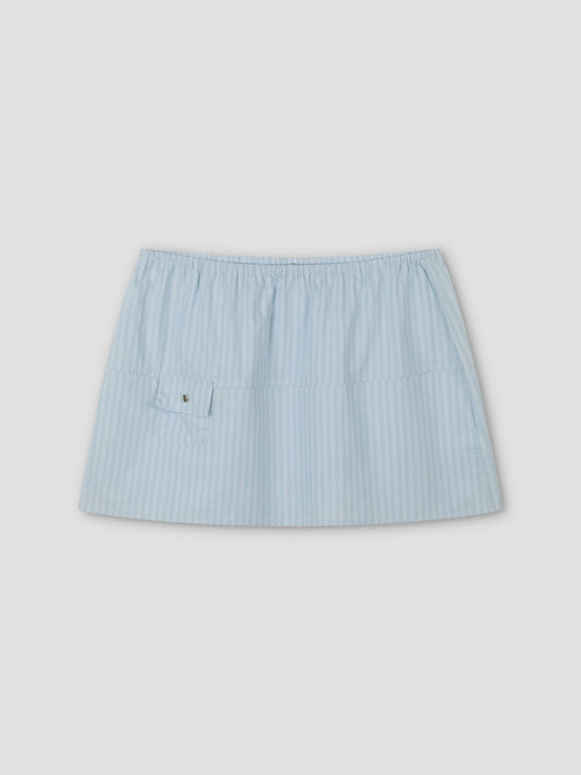 Pocket Skirt - Lake Blue Stripe: a light blue and white striped mini skirt with an elastic waistband and small front pocket, shown on a plain light gray background.