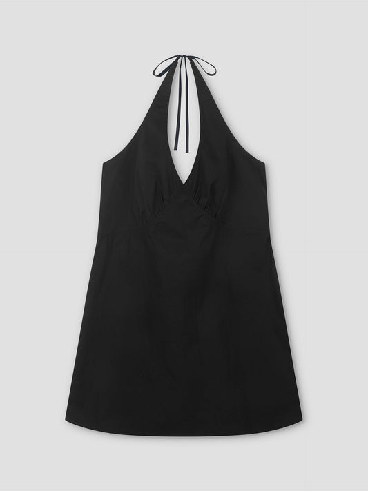 The Cinched Halter Dress - Black is a lightweight dress with a deep V-neckline and slight hem flare, shown laid flat on a light gray background.