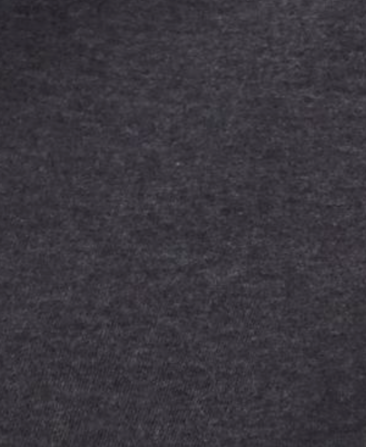 Close-up view of the Flounce Tee - Grey, highlighting its soft, slightly textured knit fabric—perfect for a fitted tee by Deiji Studios.