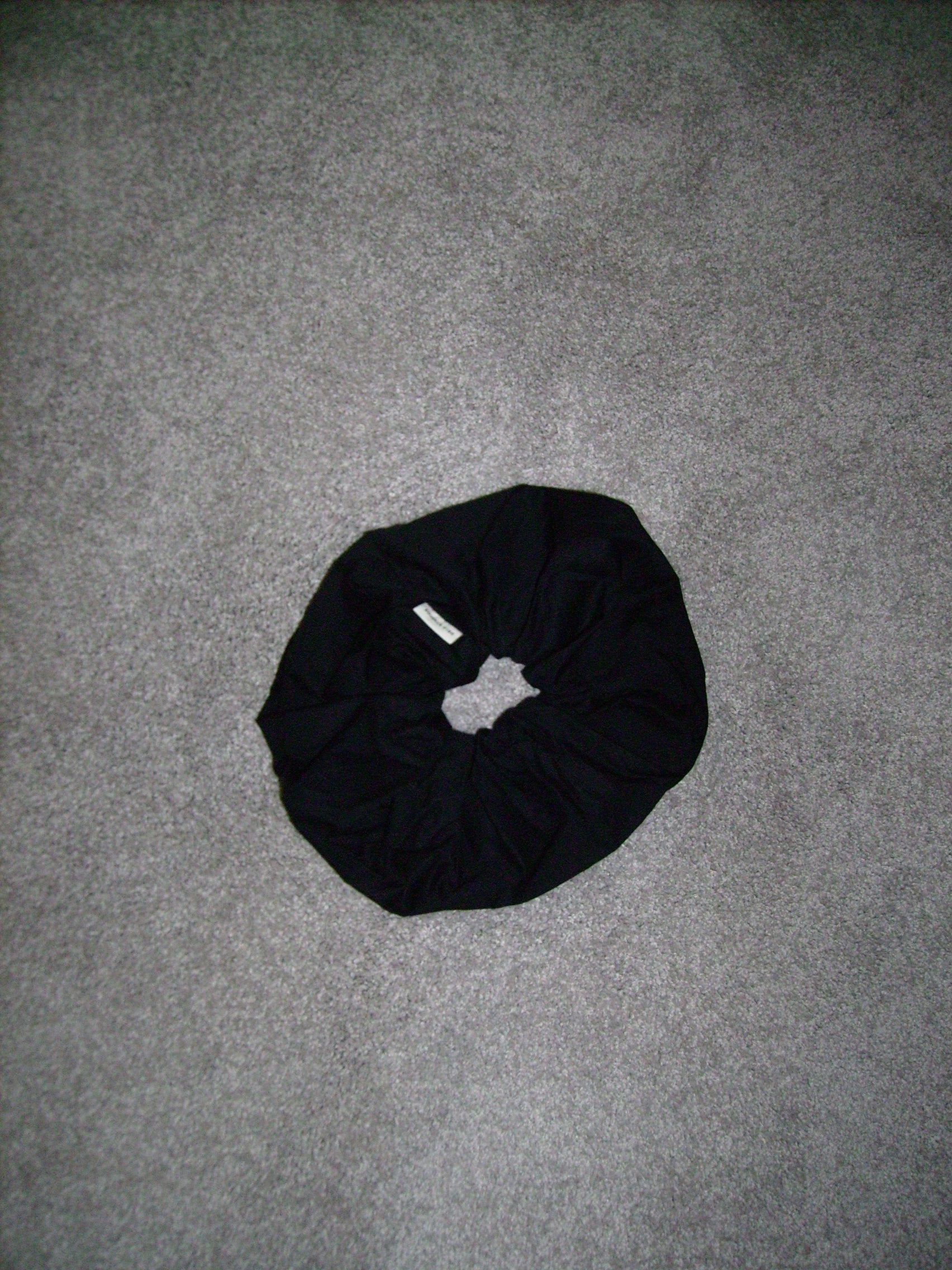 Scrunchie - black by Deiji Studios on grey carpet
