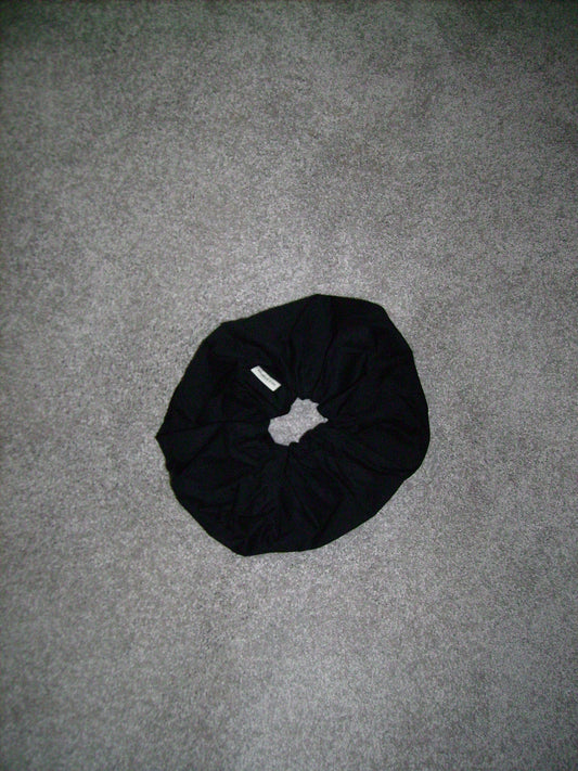 Scrunchie - black by Deiji Studios on grey carpet