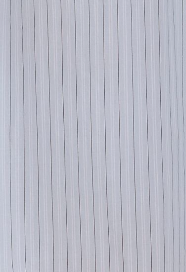 Close-up of the Yoke Mini Dress - Mineral Stripe by Deiji Studios, featuring light gray fabric with thin, evenly spaced vertical black pinstripes—perfect for an elegant a-line mini dress look.