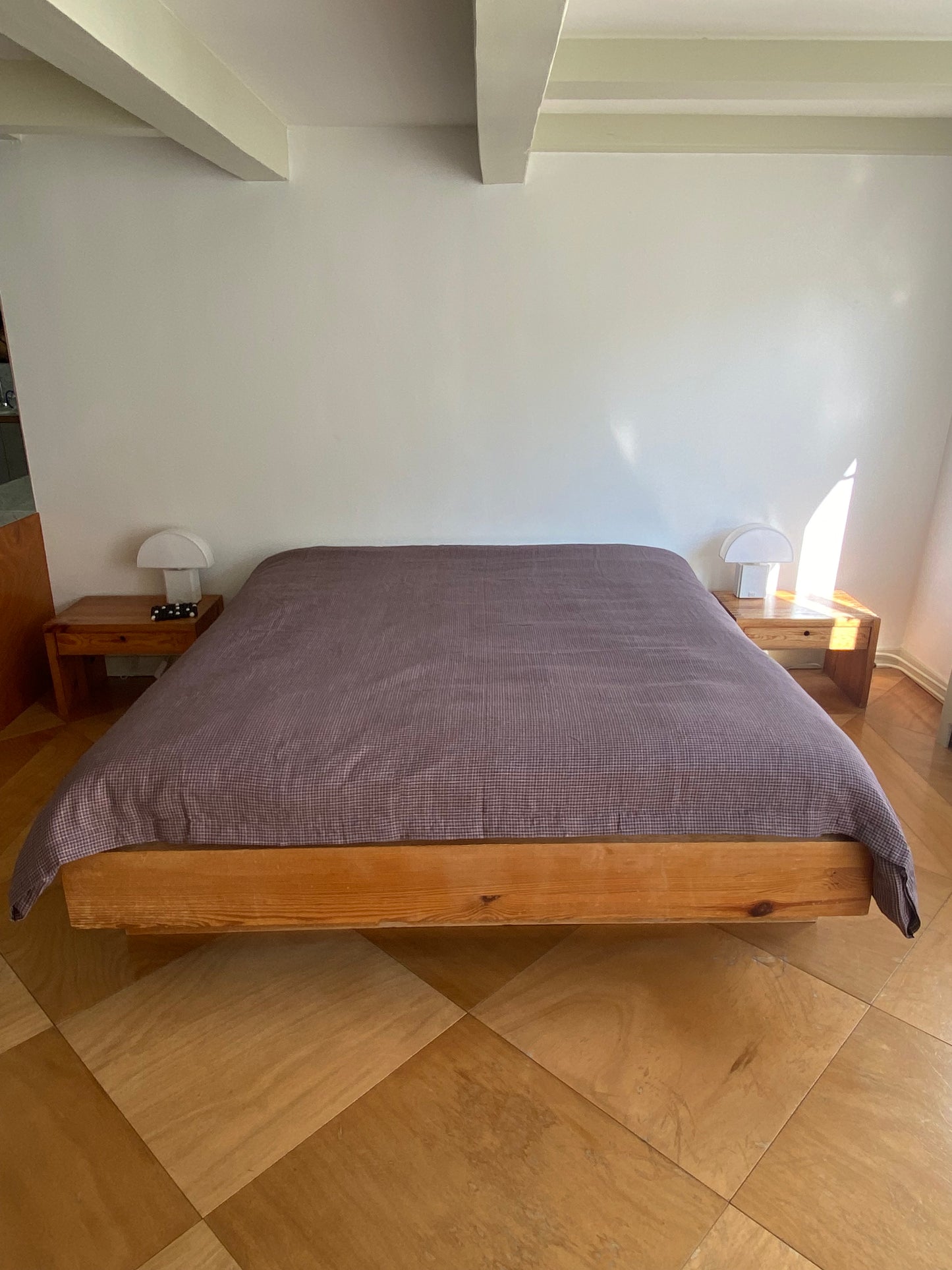 Light room with queen bed topped with Duvet cover - russet check by Deiji Studios