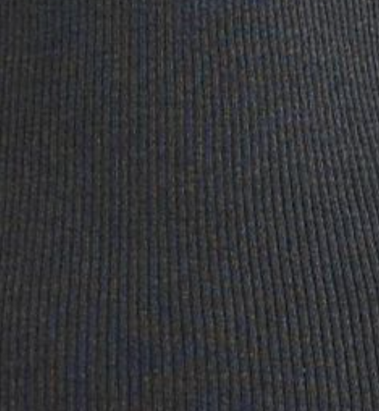 Close-up of a dark, ribbed lyocell fabric with vertical textured lines and evenly spaced ridges, from the Deiji Studios Ribbed Tank in Dark Charcoal. The material’s knit construction creates a distinctive tactile look.