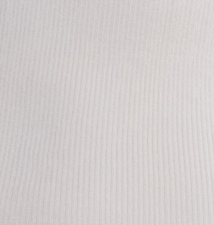 Close-up of Deiji Studios' Ribbed Tank - Off White, featuring soft lyocell fabric with vertical ribbing and subtle shadows.