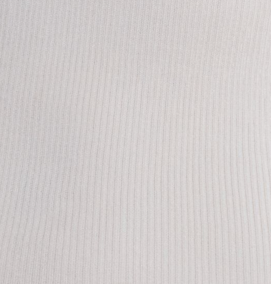 Close-up of Deiji Studios' Ribbed Tank - Off White, featuring soft lyocell fabric with vertical ribbing and subtle shadows.