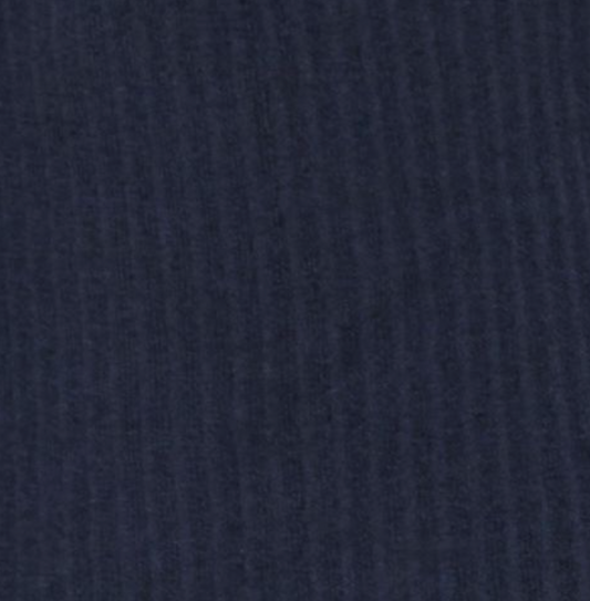 Close-up of the Polo Knit - Dark Blue, featuring dark navy blue organic cotton corduroy with visible vertical ridges and a soft, textured look.