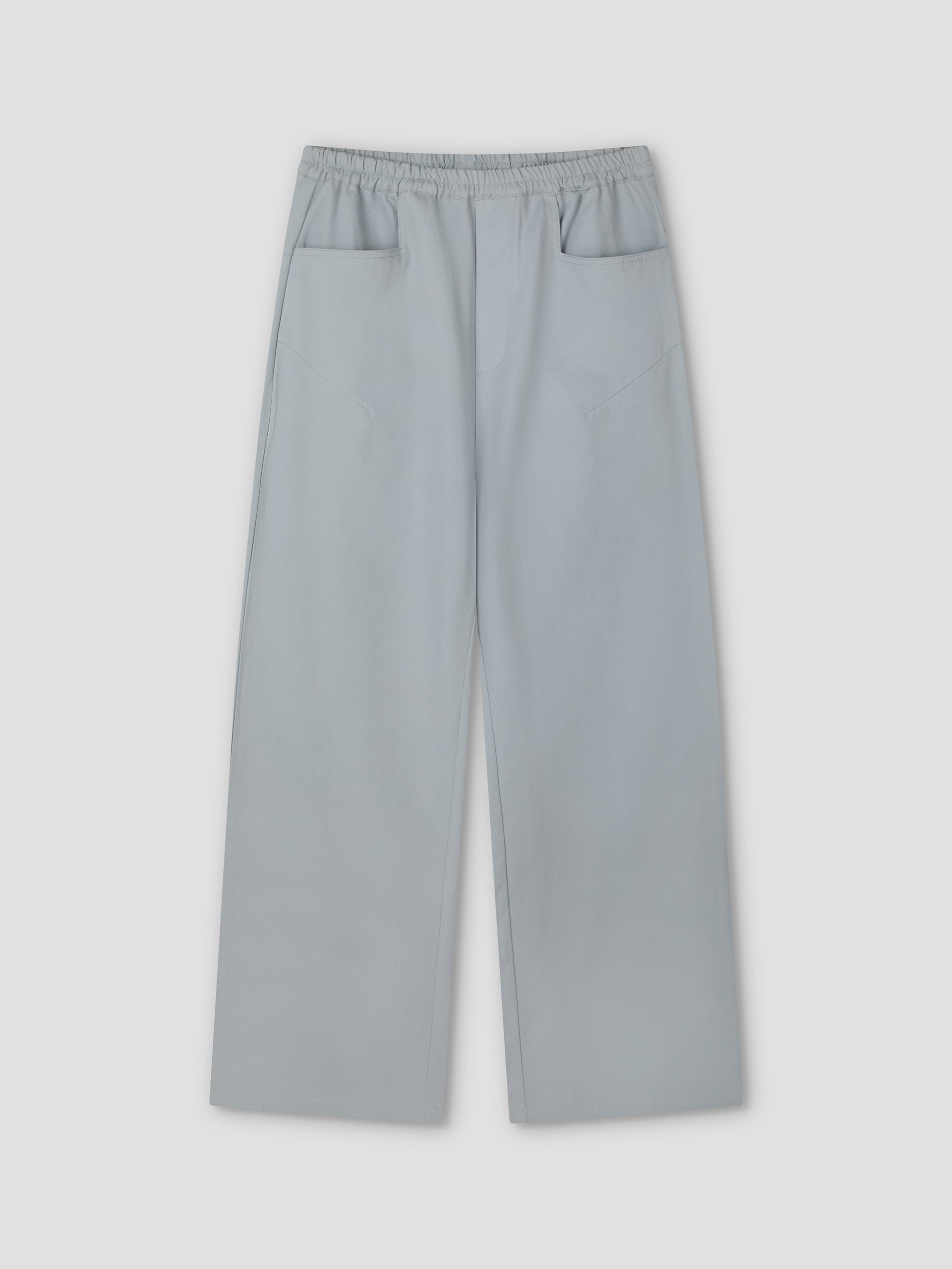 Square Pocket Pant - Blue: Relaxed blue pant with an elastic waistband, two square front pockets, and a wide, straight leg silhouette, shown flat on a plain background.