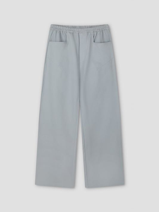 Blue Square Pocket Pant featuring a relaxed fit, wide straight-leg silhouette, elastic waistband, and two front pockets, shown against a plain light background.