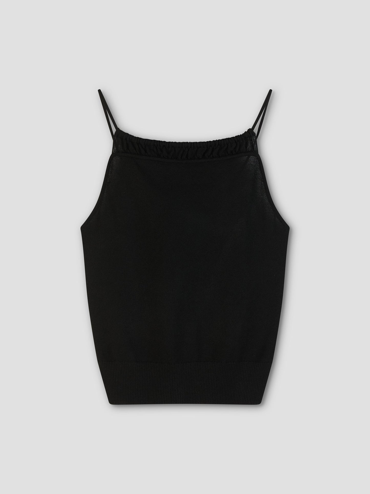 The Drawcord Knit Top - Black is a sleeveless, fine knit tank with thin spaghetti straps and an adjustable ruched neckline, shown against a light gray background.