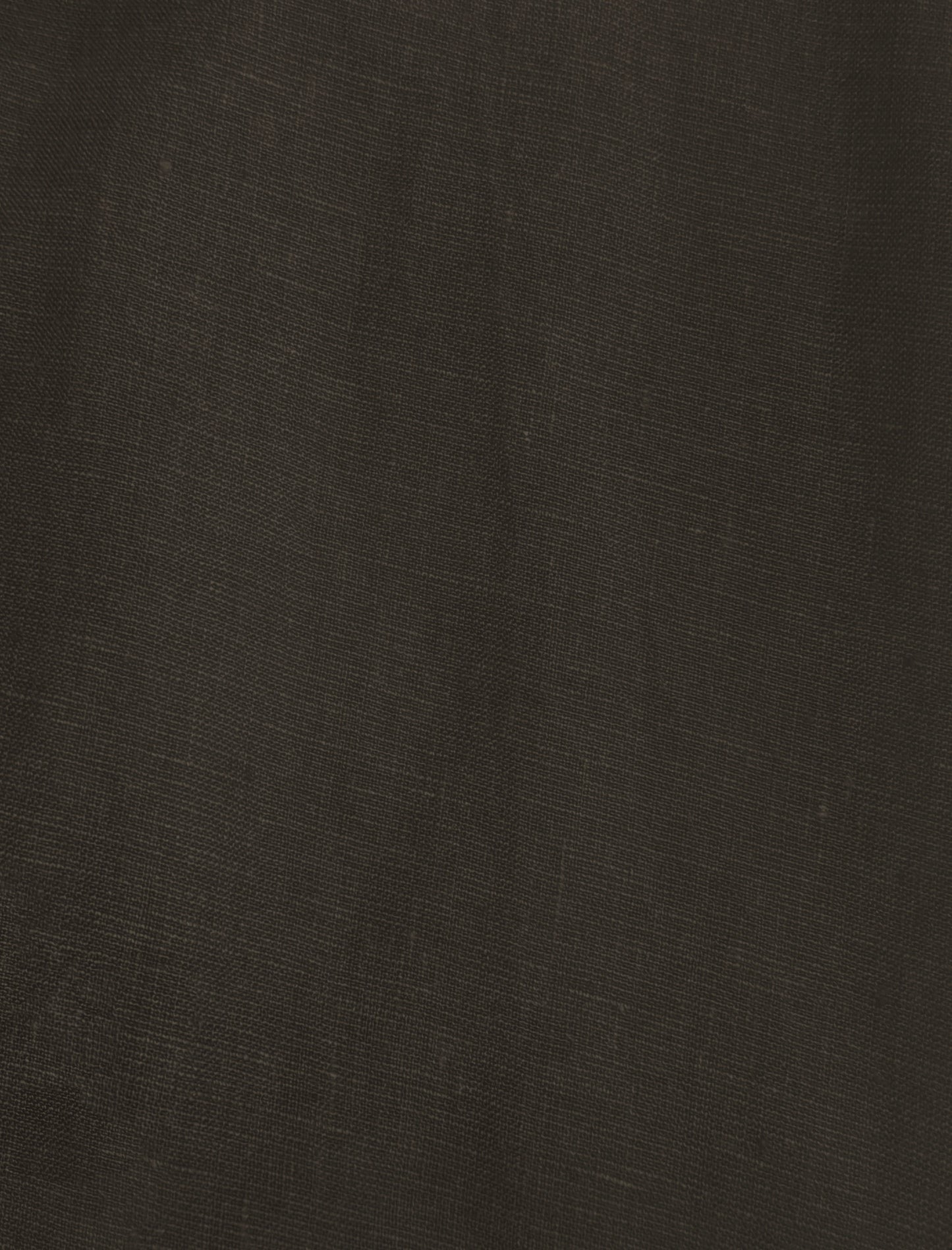 Close-up of Sheets - Bark shows dark brown woven fabric with a fine weave and subtle natural creases, reminiscent of eco-friendly linen.