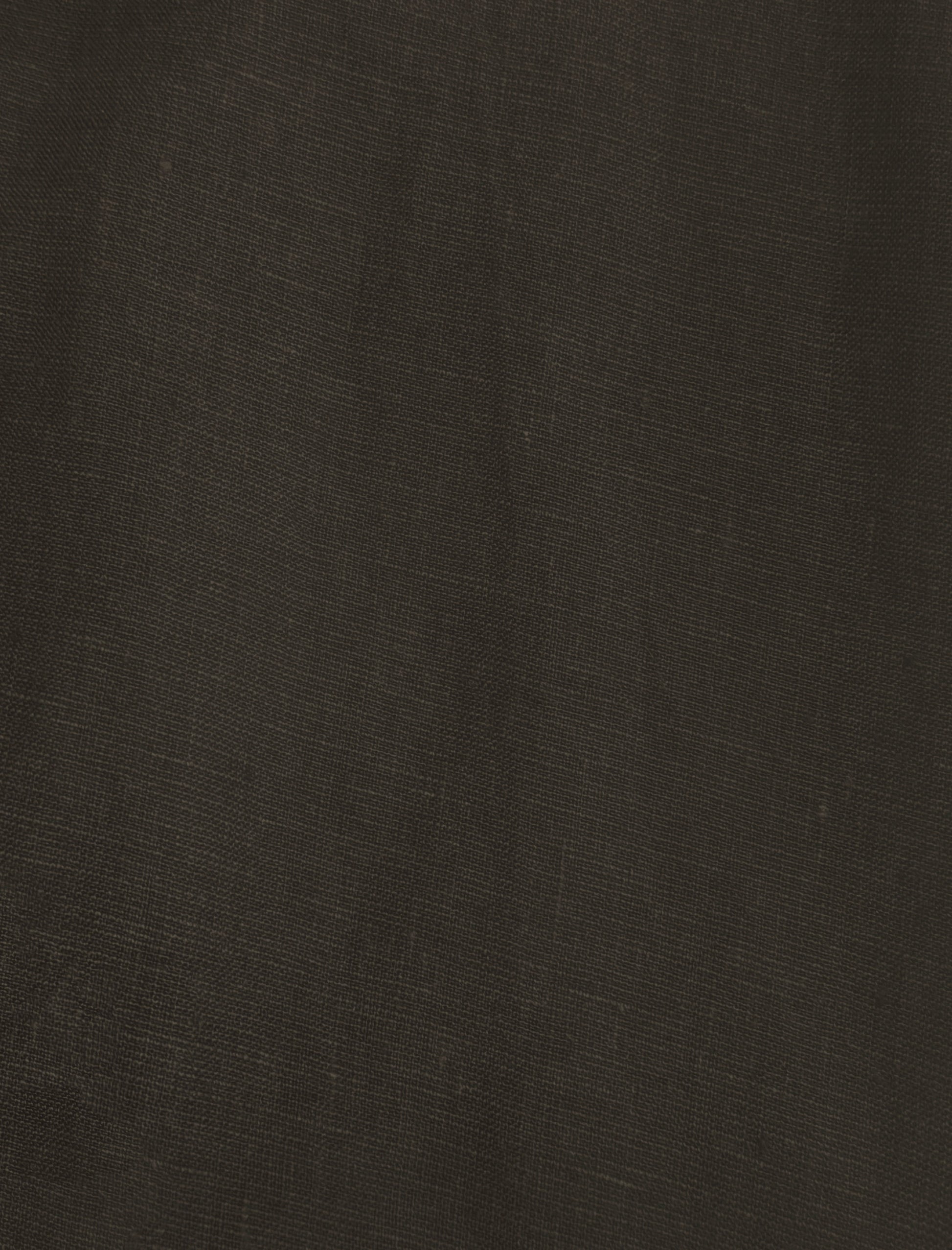 Close-up of Sheets - Bark shows dark brown woven fabric with a fine weave and subtle natural creases, reminiscent of eco-friendly linen.