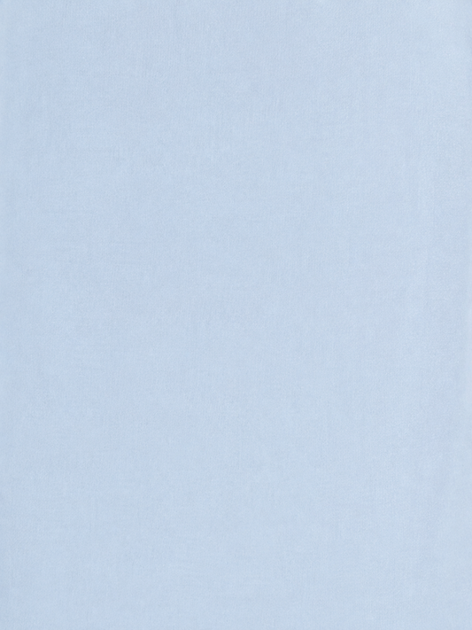 Close-up of the Baby Blue fabric by Deiji Studios: a smooth, lightweight baby blue cotton, shown flat.