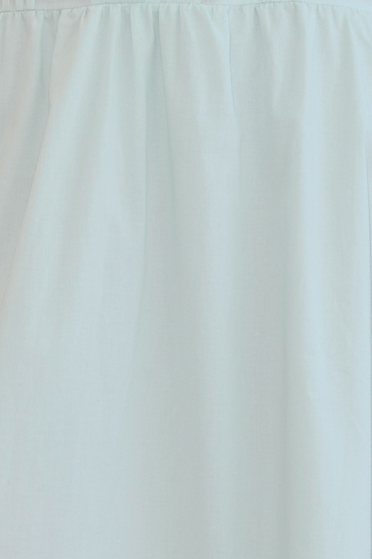 The Simple Skirt - Mint features a light blue organic cotton fabric with a gathered seam near the top, creating soft vertical folds. Lightweight and slightly translucent, it showcases Deiji Studios' signature minimalist design.