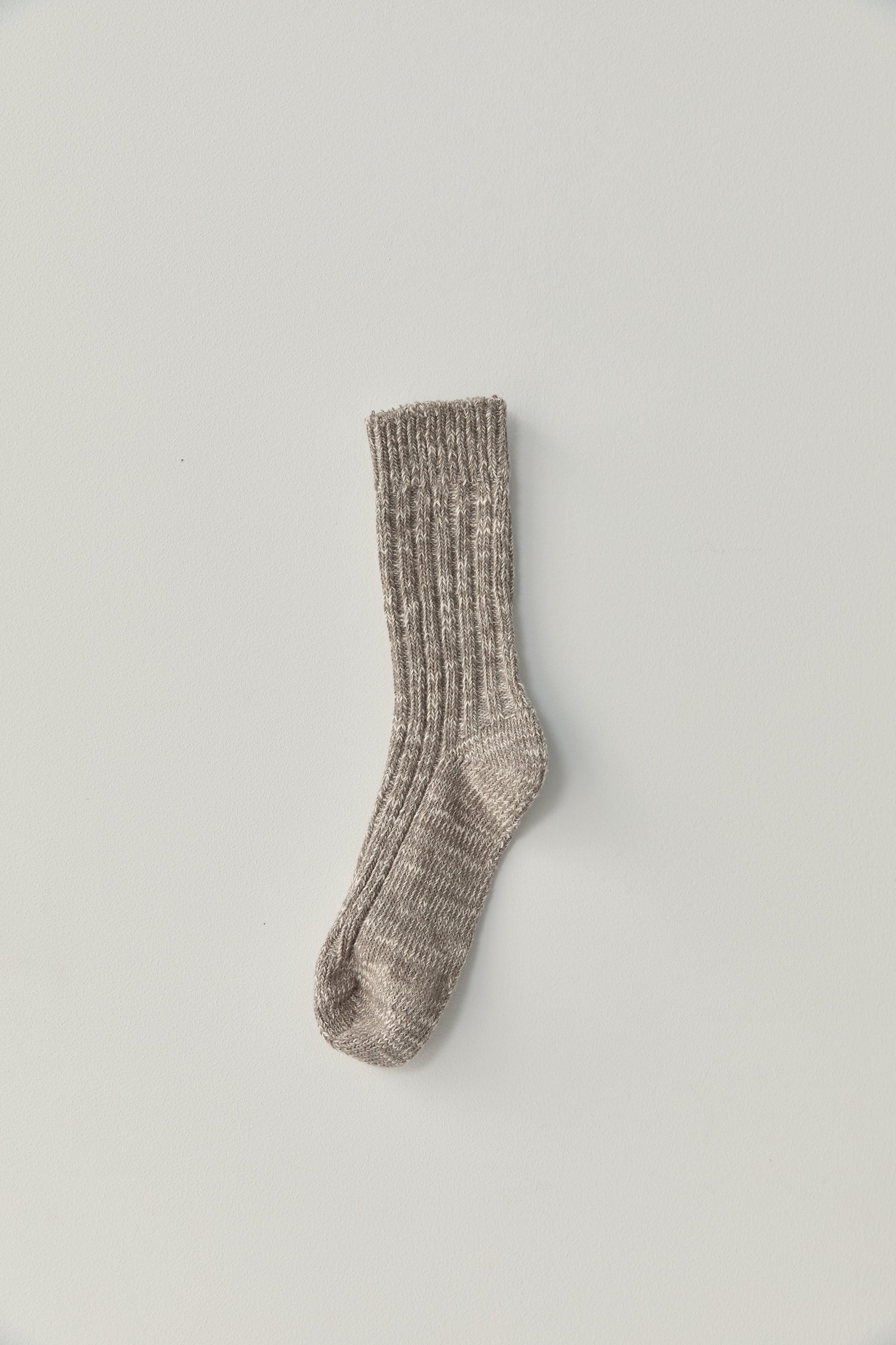 the woven sock - fog by Deiji Studios against plain background